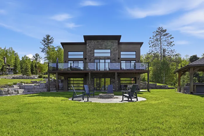 Modern stone and black rear elevation