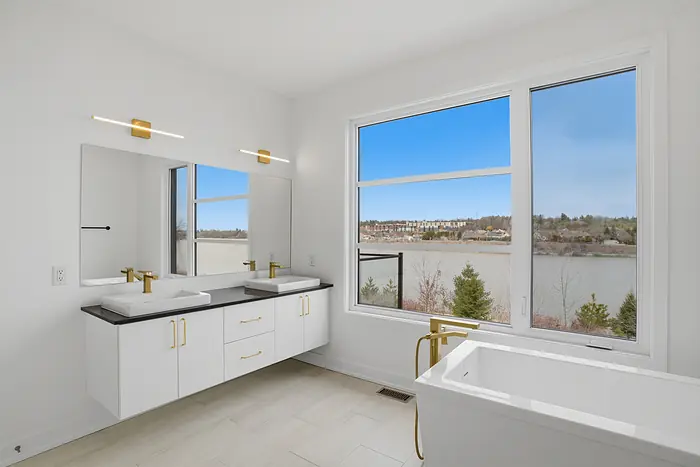 Double vanity facing the water