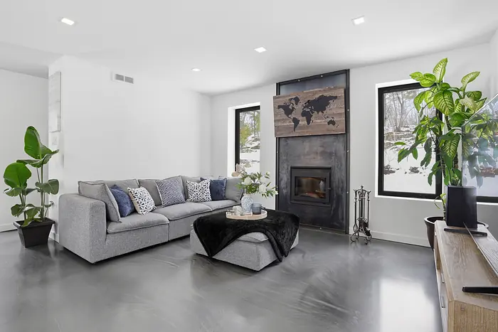 Living room with a slate fireplace